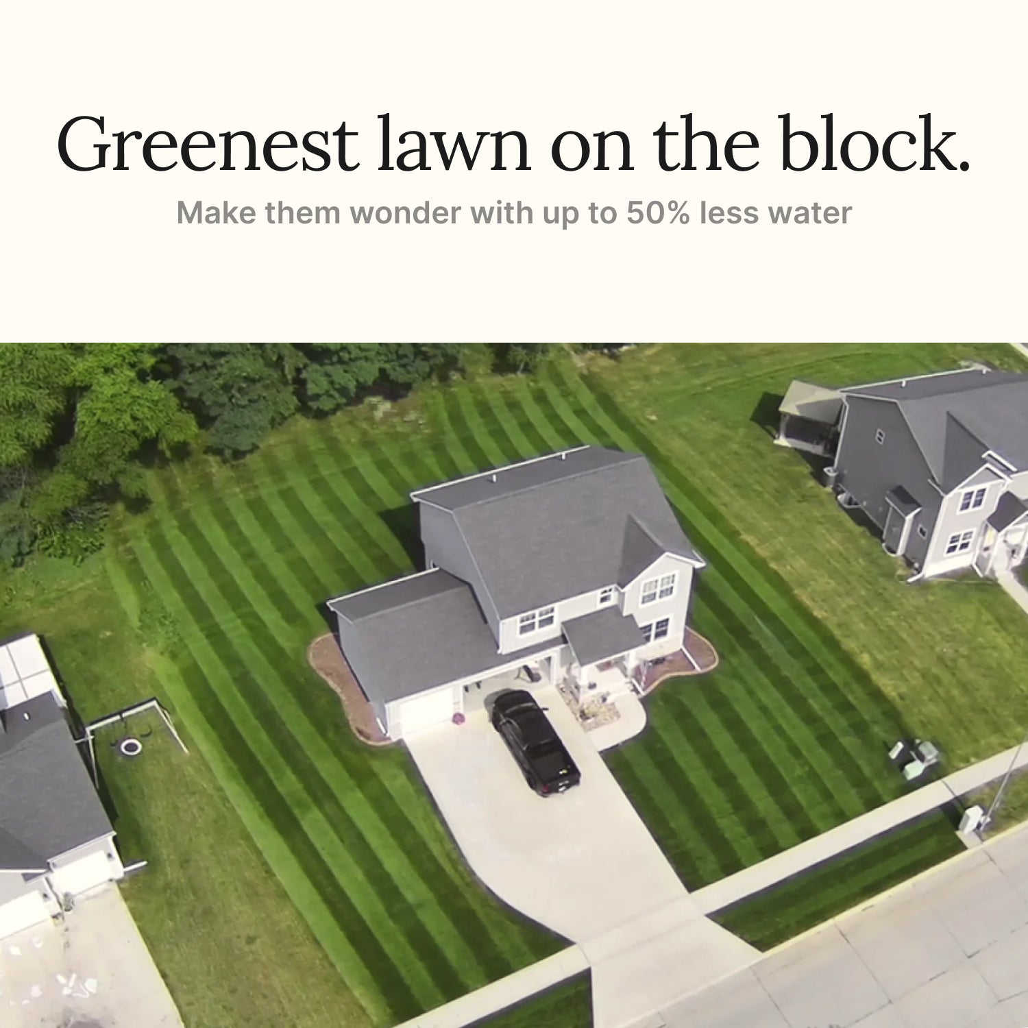 Aerial view of a house with a well-maintained lawn, promoting water conservation.